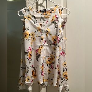 Express cold shoulder- floral brand new with tags. Long sleeves .